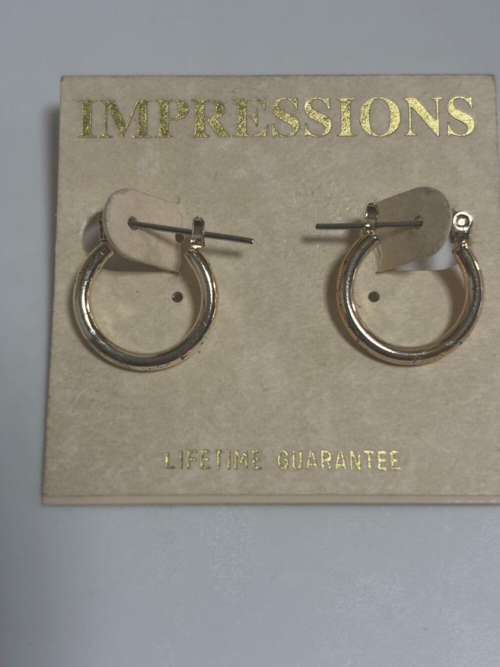 Impressions Silver Tone Hoop Earrings on Original Card